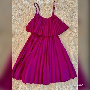 Thin strap purple dress.